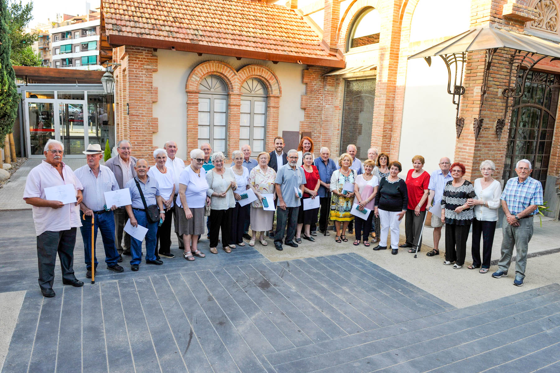 Fotografia de grup de les persones homenatjades