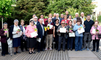 Foto de família de les persones participants a l'acte